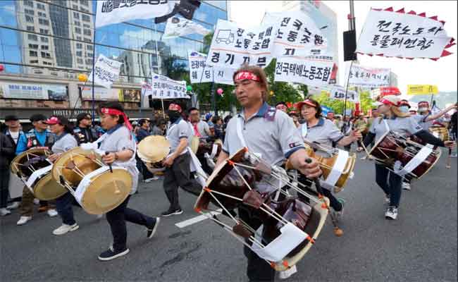 Mobilisation pour la Fête du Travail: Revendications en Asie